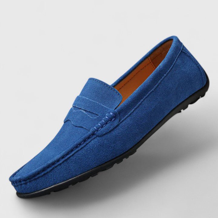 Classic men's slip-on loafers, versatile footwear for casual or dressy occasions.