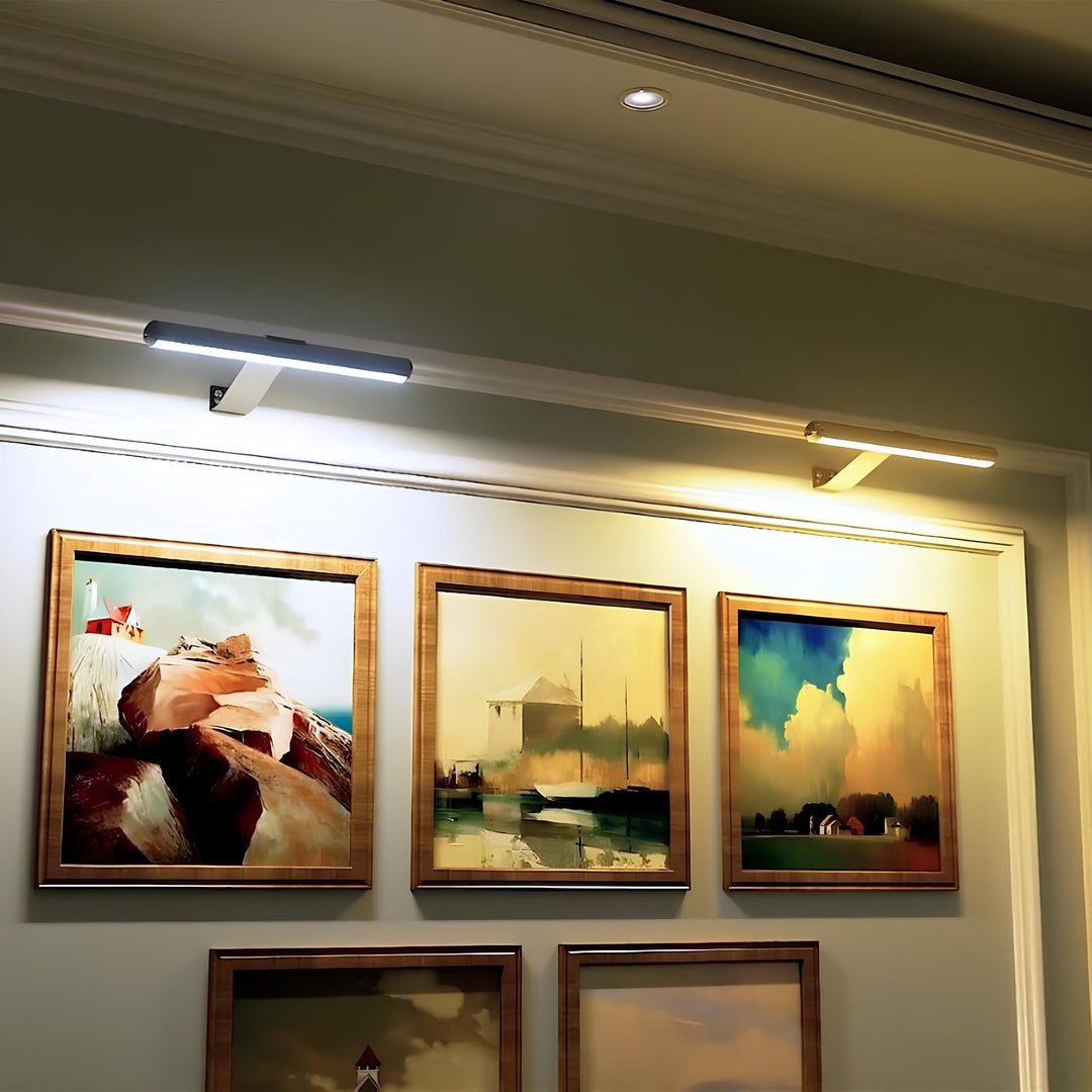 Modern rechargeable LED picture light, cordless, remote-controlled, perfect for home gallery.