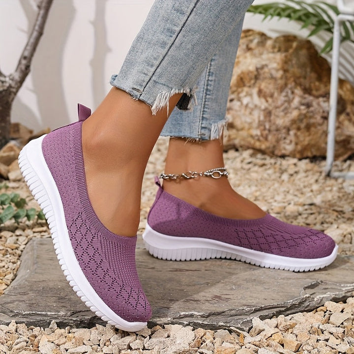 Lightweight women's orthopedic slip-on sneakers with cushioned sole for walking comfort.