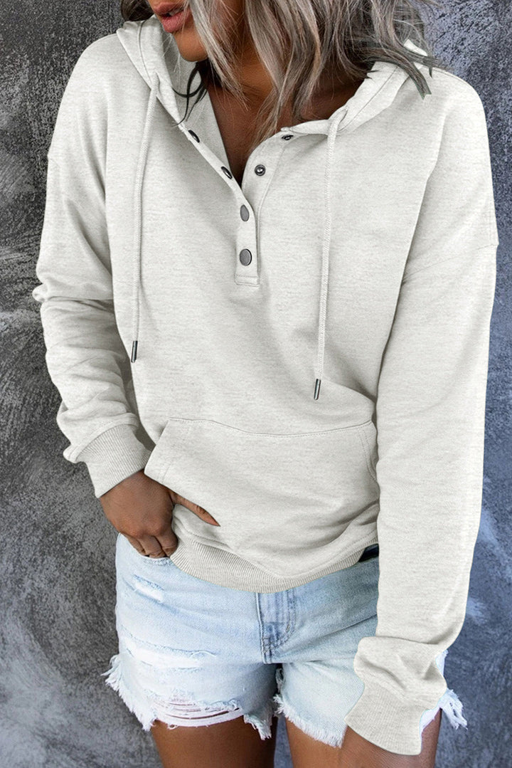 Minimalist women's hooded sweater, comfortable and effortlessly stylish everyday apparel.