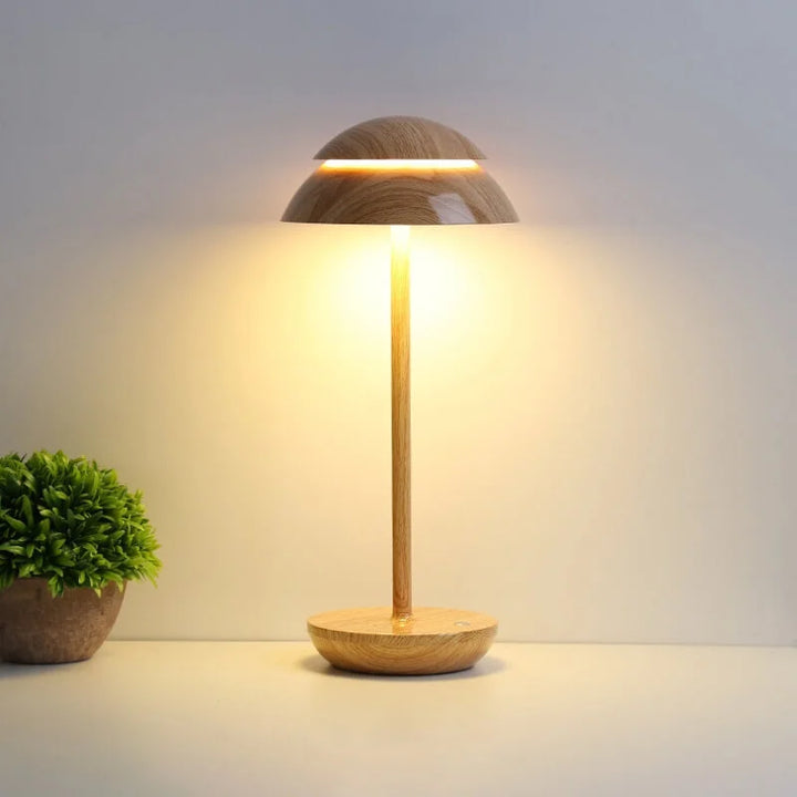 Energy-efficient LED table lamp. Minimalist Nordic design, rechargeable & portable for any room.