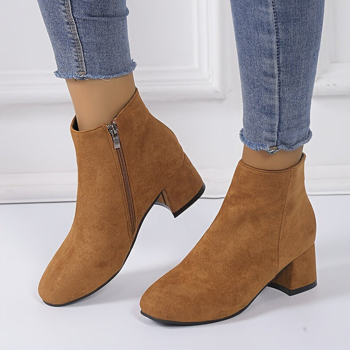 Stylish women's Chelsea ankle boots. Easy wear & comfortable block heel. Perfect for elegant fall & winter women's fashion.