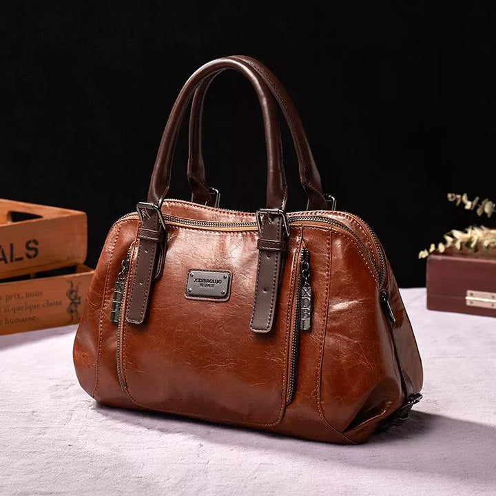 Women's premium leather shoulder bag for everyday elegance, featuring a stylish design & durable finish.