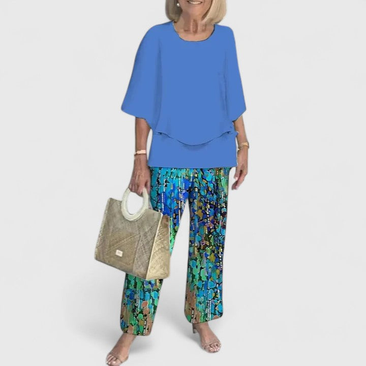 Women's stylish two-piece set: elegant top & trousers. Relaxed fit, perfect for casual chic summer fashion.