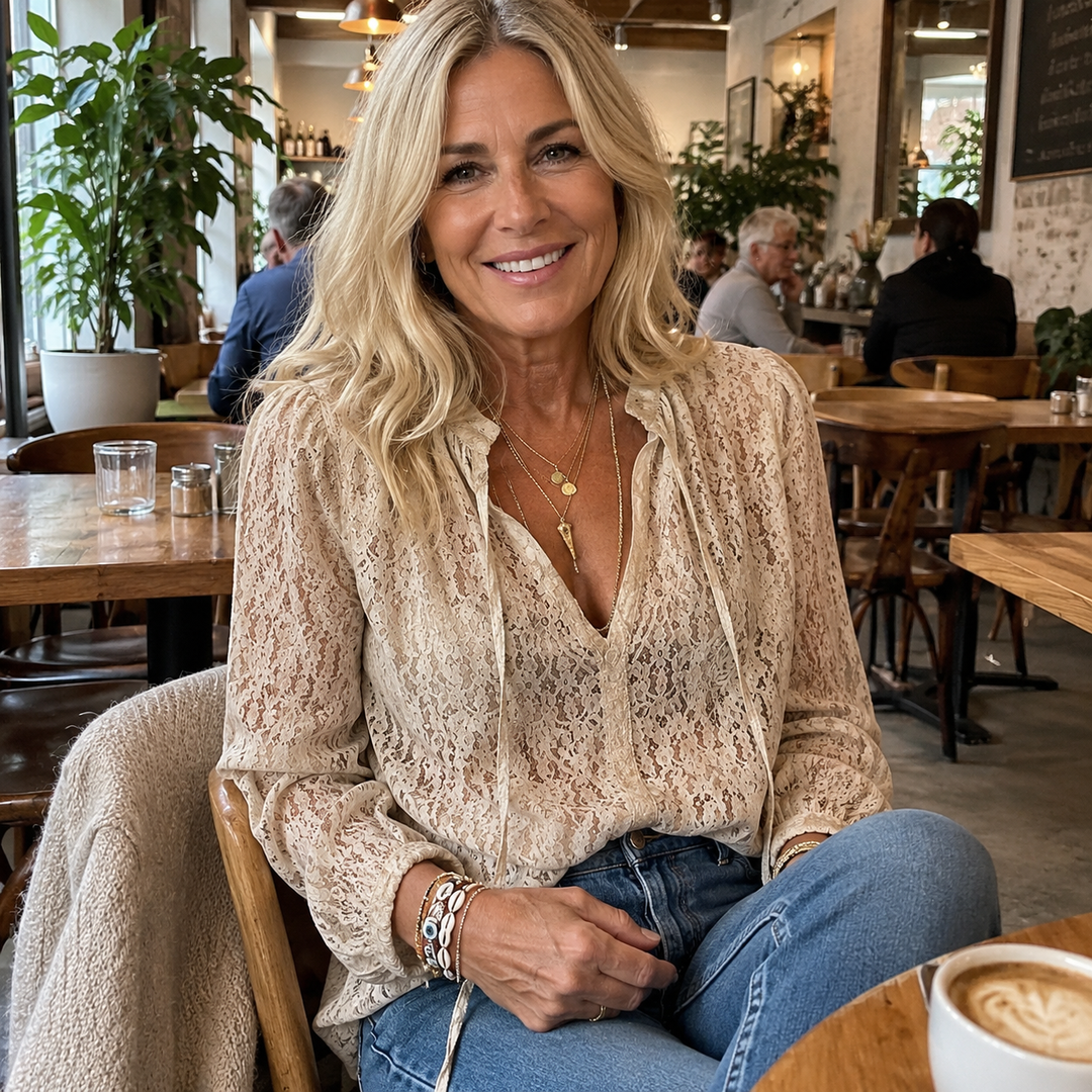 Feminine boho lace v-neck blouse, relaxed fit perfect for women's summer fashion.
