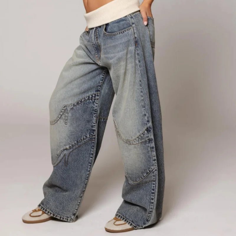 Stylish women's wide leg baggy jeans in a vintage light wash. Perfect comfortable fashion bottom for streetwear.