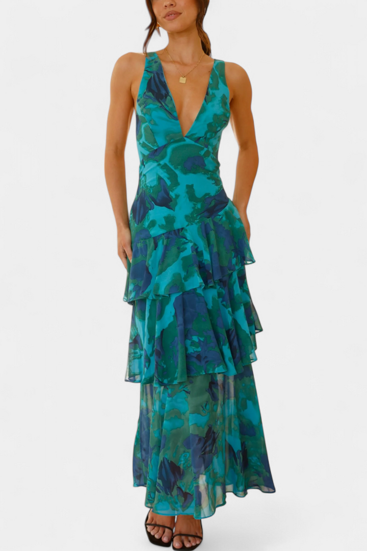 Women's flowy tiered ruffle maxi dress, ideal wedding guest or formal event attire.