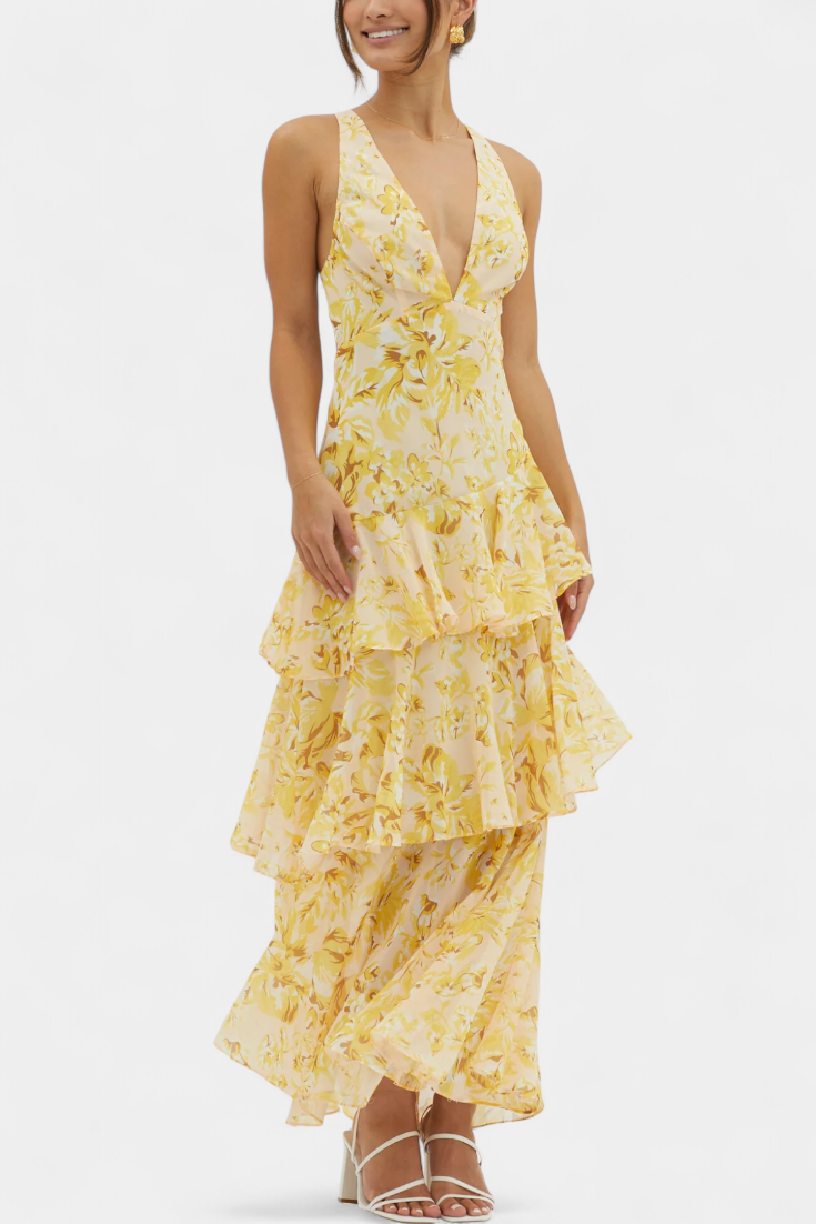 Statement tiered ruffle maxi dress, elegant and flowy for any special occasion.