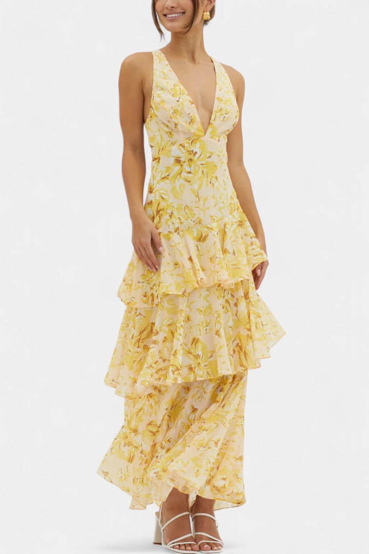 Statement tiered ruffle maxi dress, elegant and flowy for any special occasion.