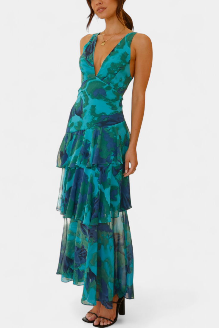 Flowy tiered ruffle maxi dress with plunging V-neck, perfect for elegant formal wear.