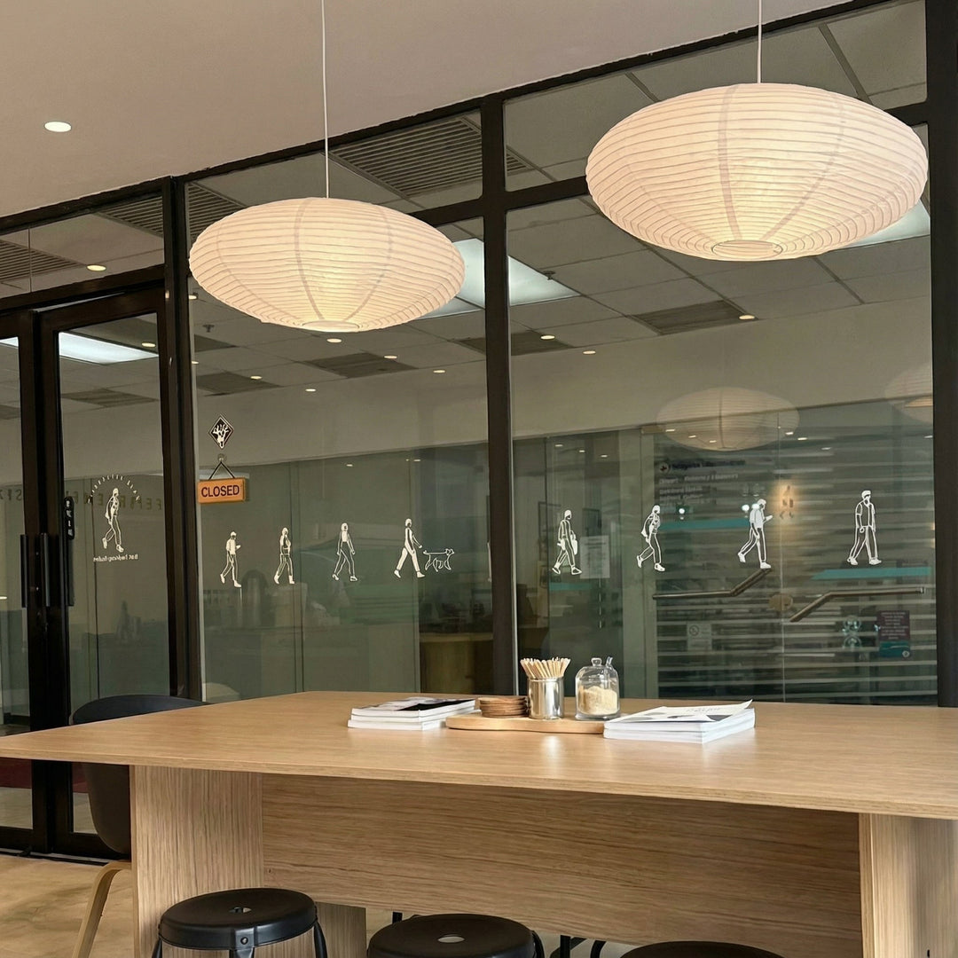Handcrafted paper pendant lamp with Wabi Sabi aesthetic, ideal for modern living room decor.