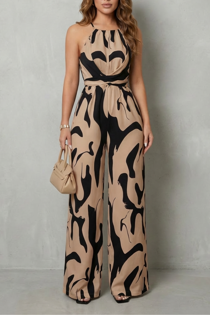 Women's elegant abstract print halter wide-leg jumpsuit, a comfortable and chic option for summer style.