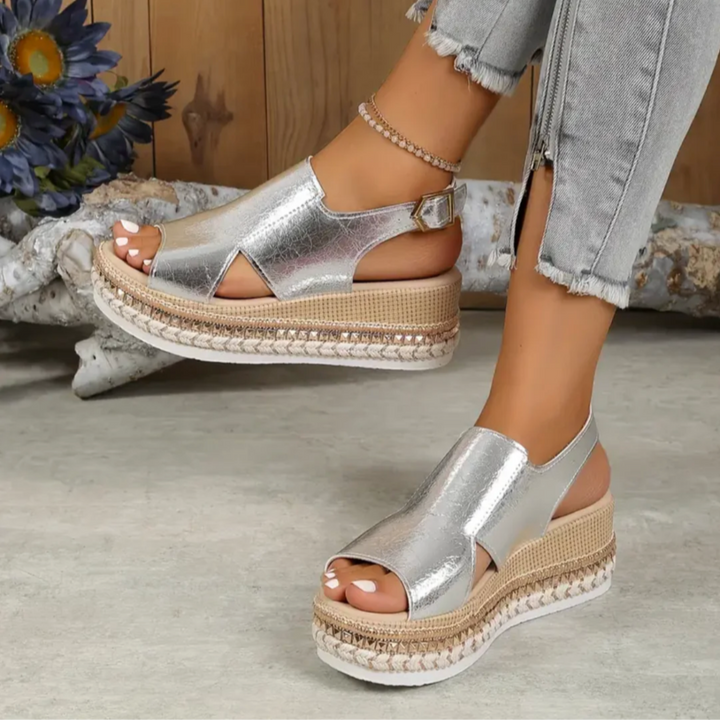 Fashionable women's platform espadrille sandals, chunky sole, gold tone, and stylish ankle strap.