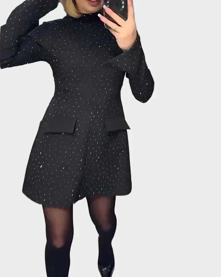 Glamorous women's long sleeve sequin mini dress featuring a sophisticated mock neck, ideal for holiday parties.