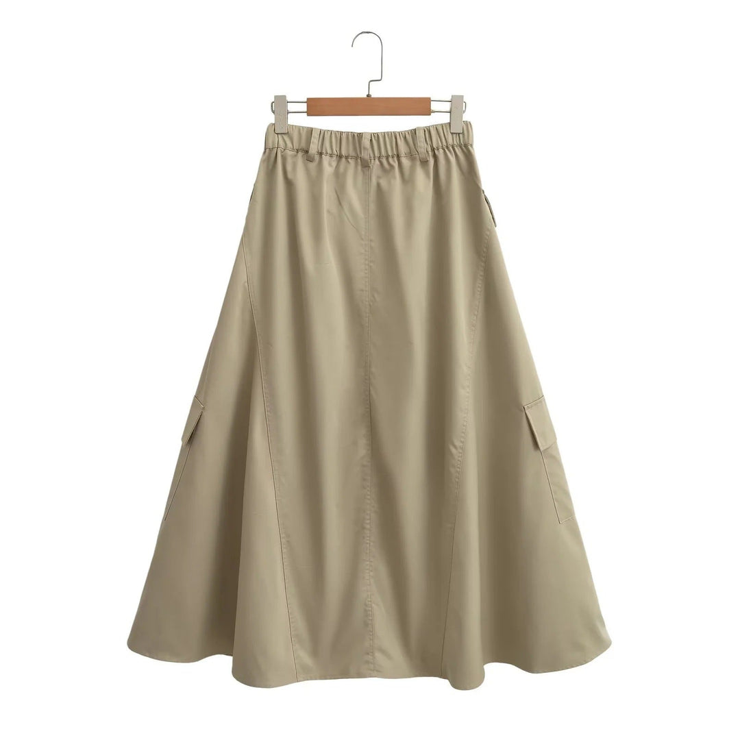 Stylish women's A-line cargo midi skirt in khaki, featuring a relaxed fit and practical utility pockets.