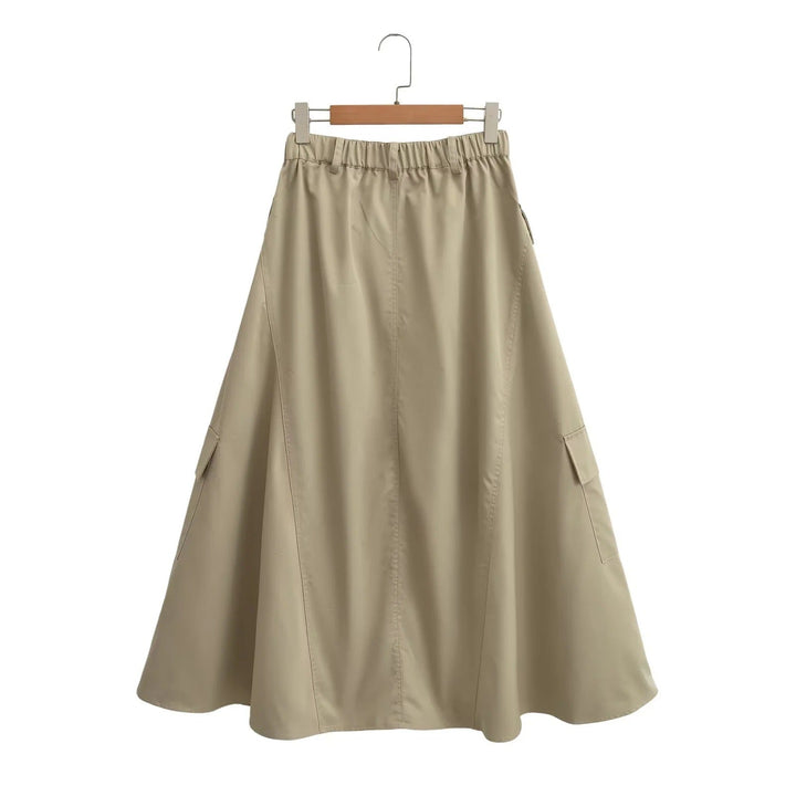 Stylish women's A-line cargo midi skirt in khaki, featuring a relaxed fit and practical utility pockets.