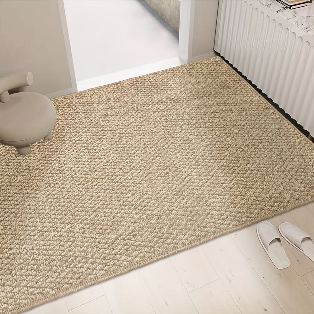 Durable outdoor door mat, absorbent & non-slip, effectively trapping dirt before entry.
