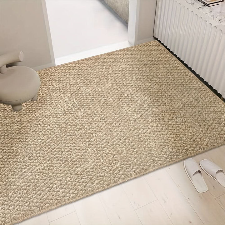 Durable outdoor door mat, absorbent & non-slip, effectively trapping dirt before entry.