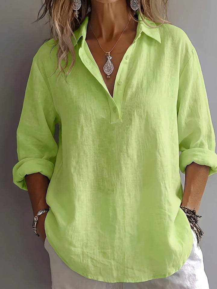 Elegant long sleeve button-up blouse. Relaxed collared top for spring & summer fashion.