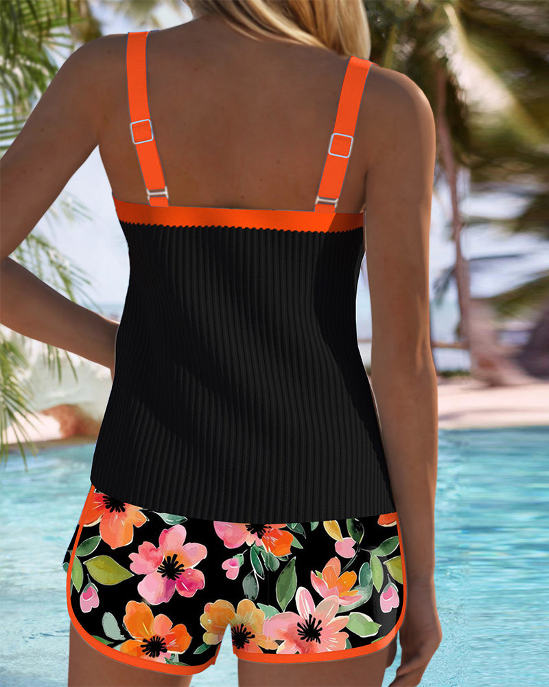 Flattering fuchsia two-piece tankini swimsuit for women, stylish and modest summer fashion.