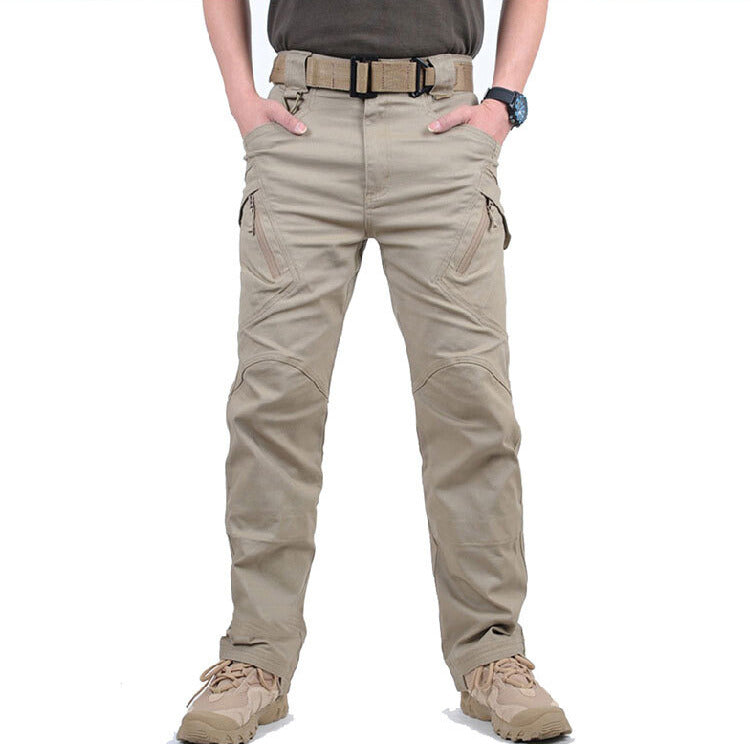 Front view of men's multi-pocket cargo pants, tactical design for rugged outdoor adventure.