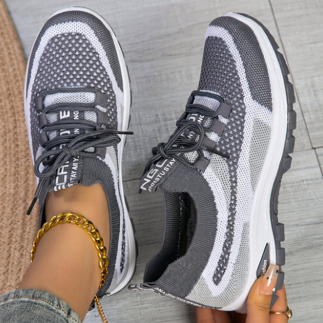 Casual women's relaxed lace-up sneakers, comfortable and breathable for everyday active wear and foot support.