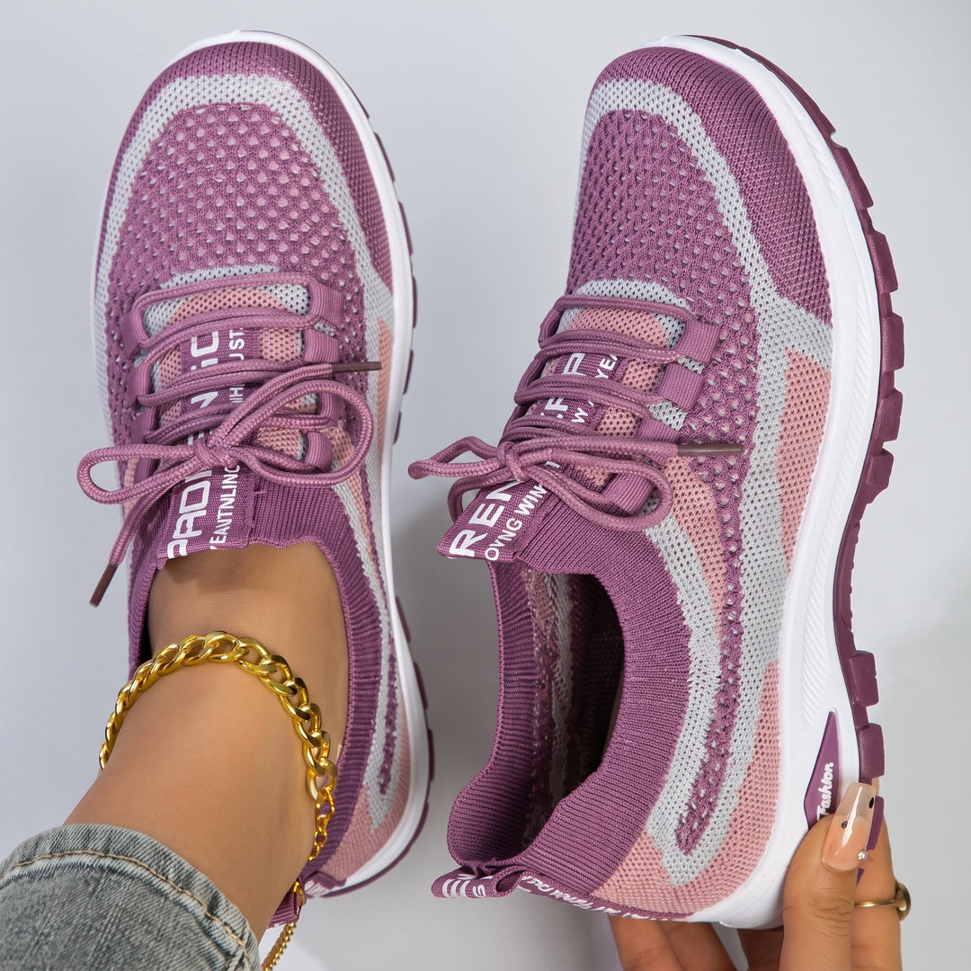 Relaxed fit women's orthopedic shoes, breathable lace-up sneakers offering superior comfort and foot support.