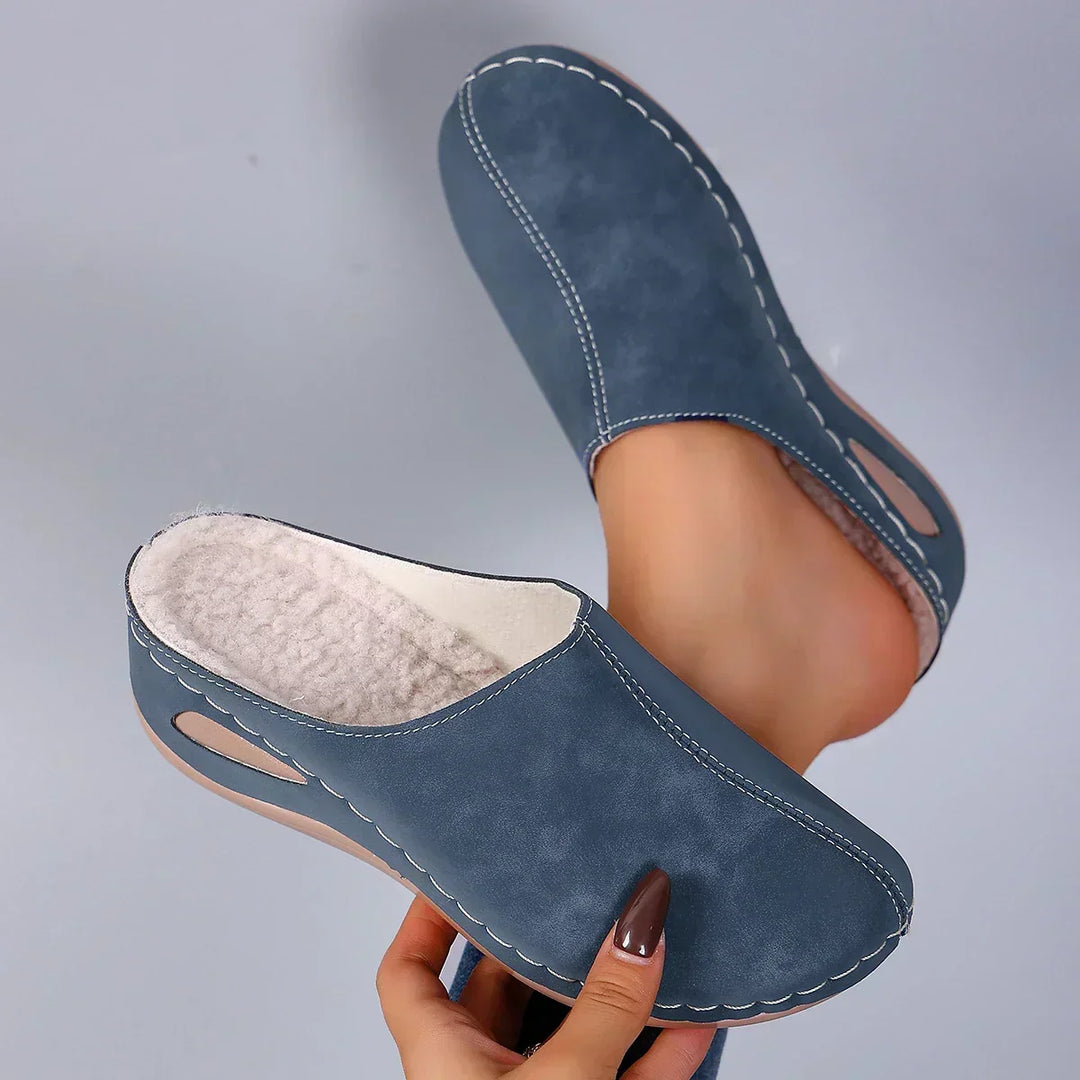 Women's gray orthopedic slip-on slippers with arch support for ultimate comfort and foot pain relief.