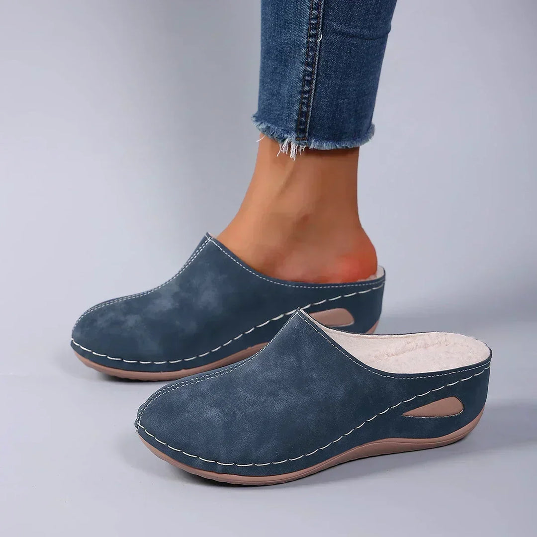 Cozy women's warm indoor slip-on slippers, cushioned for ultimate home comfort and support.