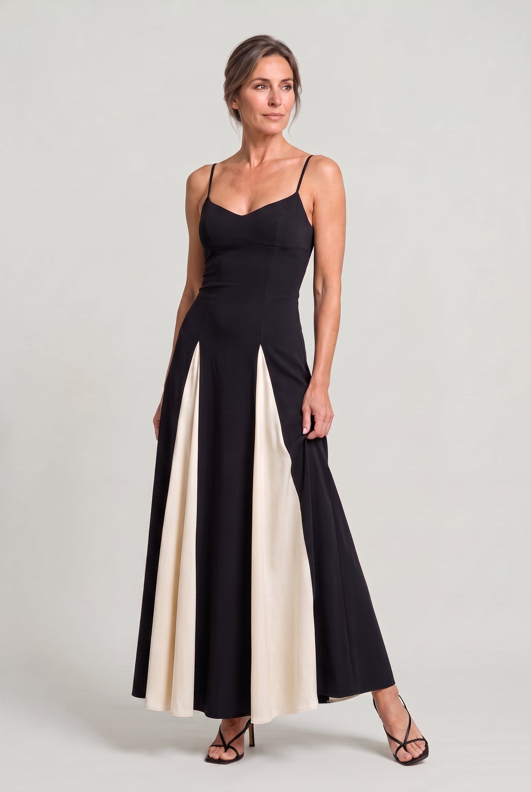 Elegant women's maxi dress with contrast panel, spaghetti straps & V-neck. Perfect for formal parties or special occasions.