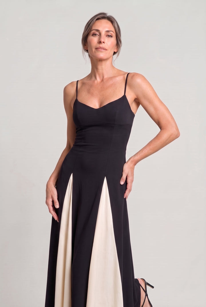 Chic women's spaghetti strap maxi dress, V-neck, flared skirt, contrast panel. Ideal for evening or formal events.