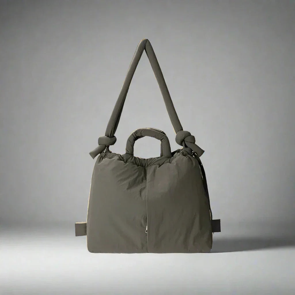Beige quilted puffer tote bag showing its spacious interior