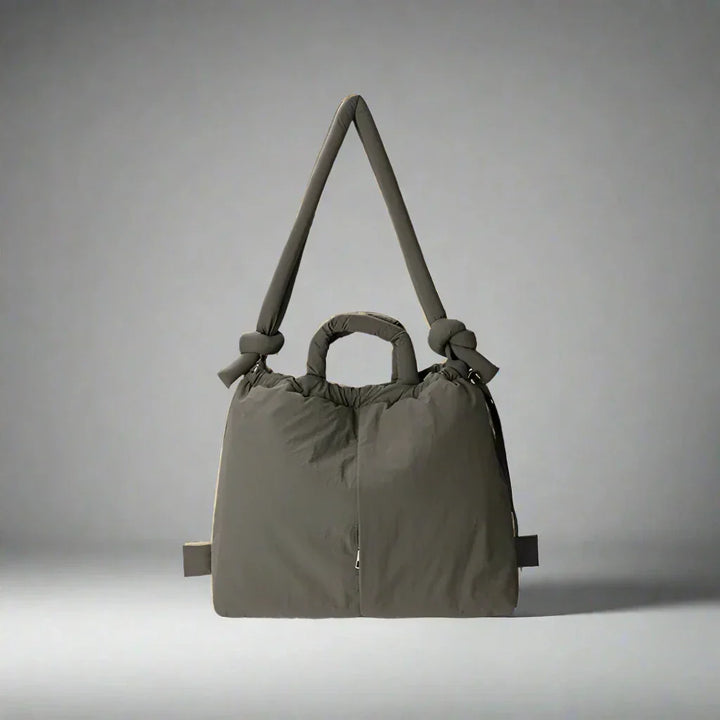 Beige quilted puffer tote bag showing its spacious interior