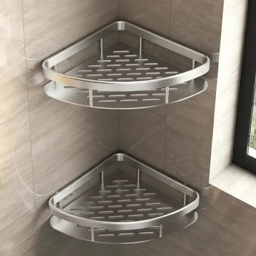 Drill-free adhesive bathroom storage shelf. Modern stainless steel wall organizer for efficient shower storage.