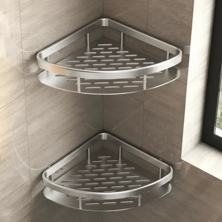 Drill-free adhesive bathroom storage shelf. Modern stainless steel wall organizer for efficient shower storage.