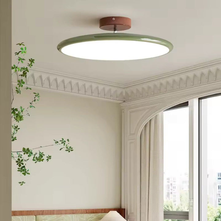 Directional modern LED ceiling light, available in green, for adjustable bedroom & kitchen lighting.