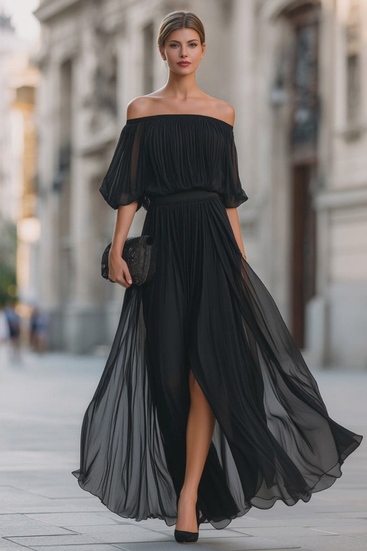 Close-up of the delicate pleats and stylish off-shoulder design on a women's evening maxi dress.