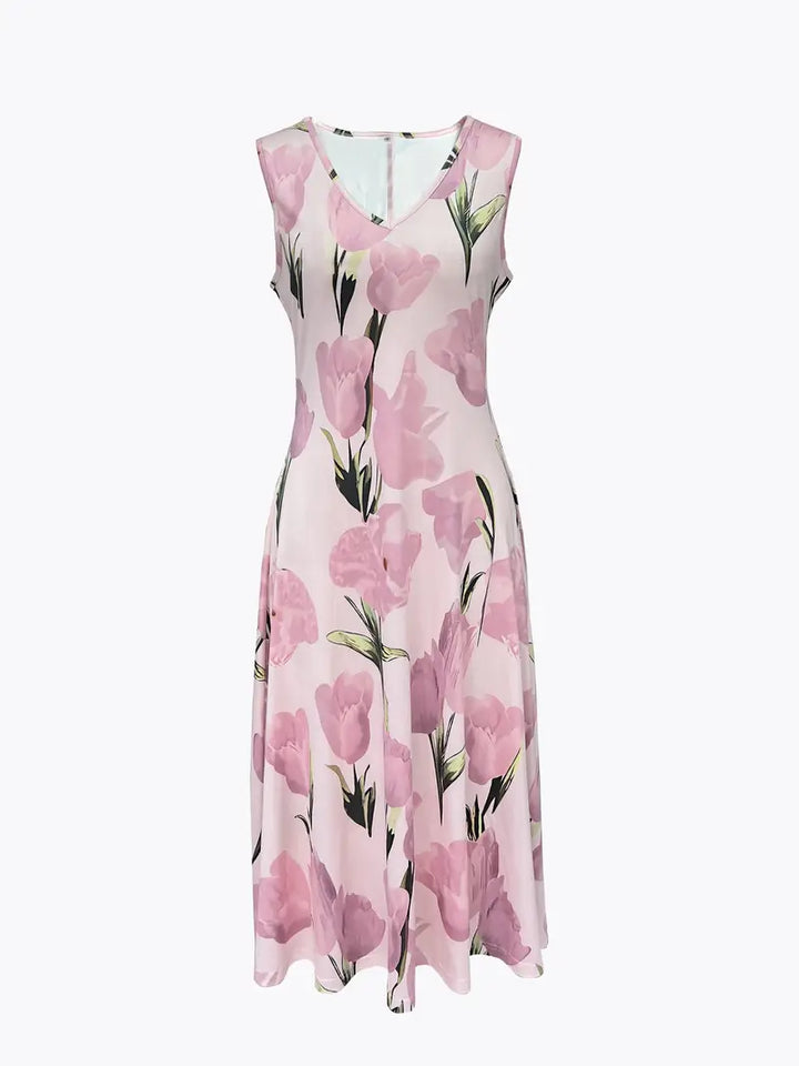 Detail of the fabric and fit of the women's floral maxi dress set.