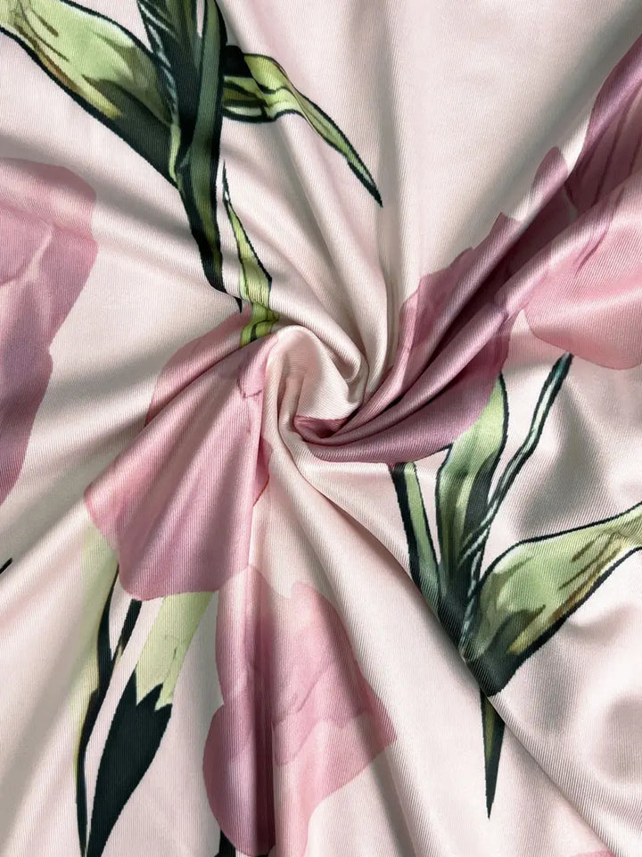 Back view of the women's pink floral maxi dress and cardigan set.