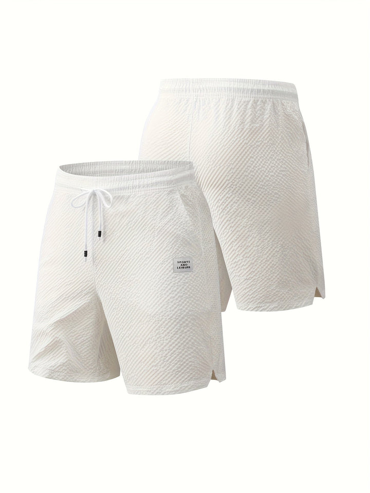 Black men's textured shorts with practical side pockets and an adjustable drawstring.