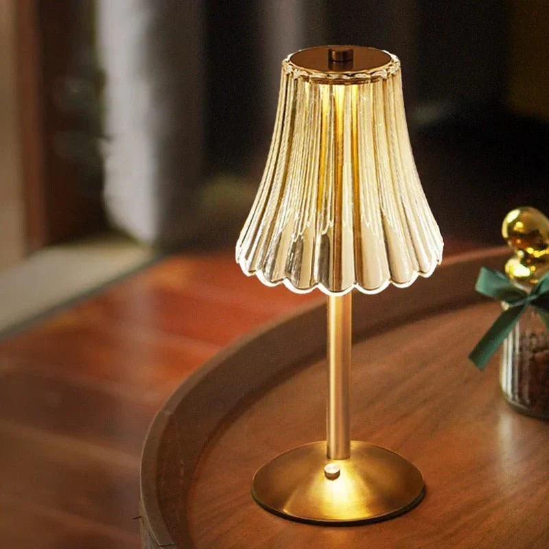 Touch control LED crystal table lamp, elegant design, with a luxurious gold base.