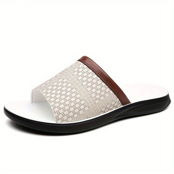Men's elegant textured slide sandals, perfect for summer comfort. Slip-on casual beach footwear with open toe.