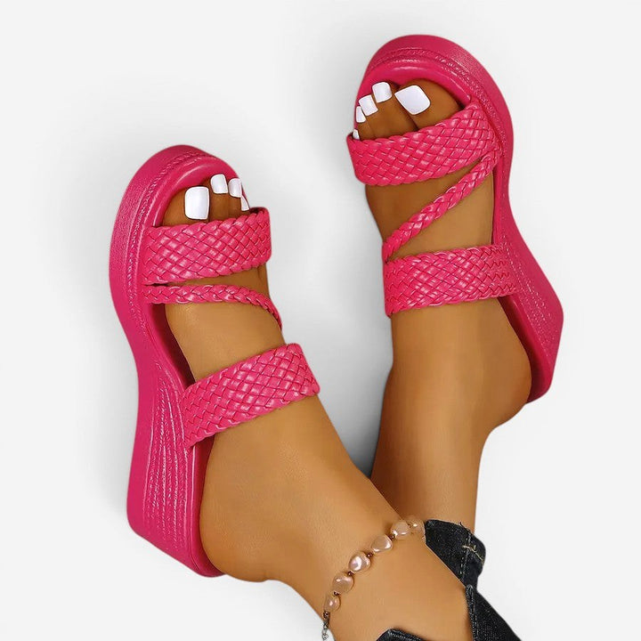 Black Ainsley padded platform slip-on sandals, versatile and comfortable women's summer footwear.