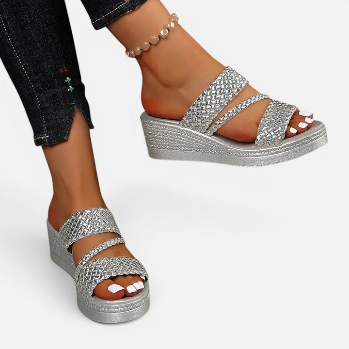 Close-up of women's Ainsley padded platform sandal, showing woven strap detail and comfort sole.