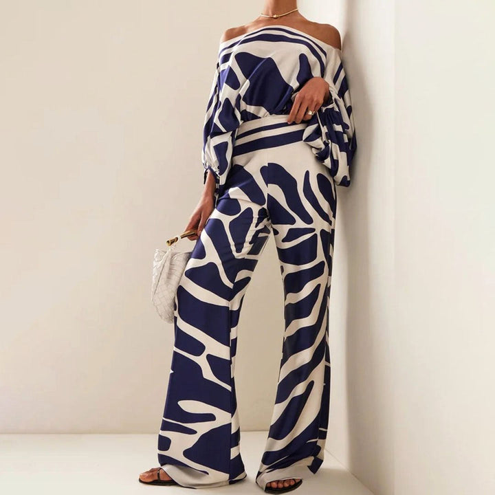 Autumn women's off-shoulder two-piece set with a unique print & comfortable lantern sleeves.
