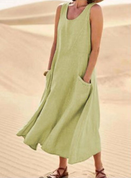 Casual women's flowy dress, relaxed fit and convenient pockets for ultimate everyday comfort.