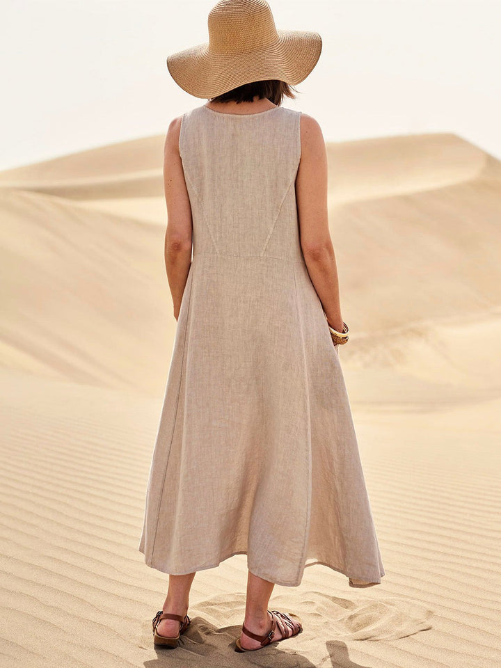 Flowy women's tunic dress, comfortable relaxed fit with pockets, perfect for summer.