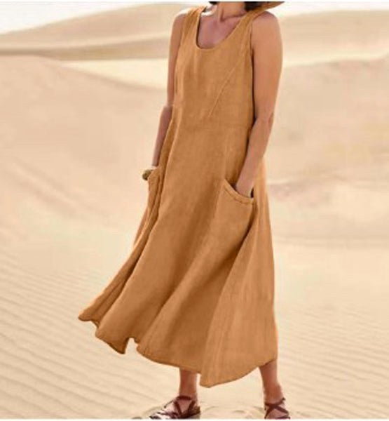 Comfortable & versatile women's relaxed dress with pockets, great for any casual occasion.