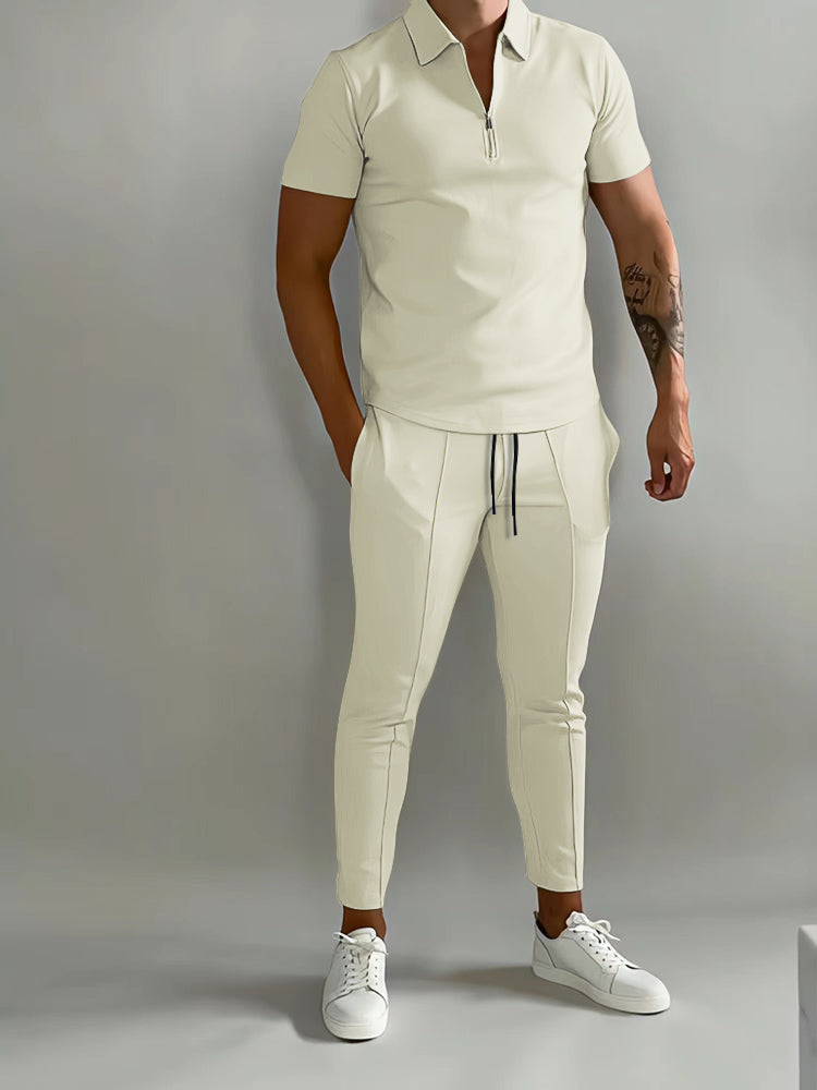 Men's stylish two-piece polo shirt and pants set. Ideal for casual wear, summer outfits, or activewear.