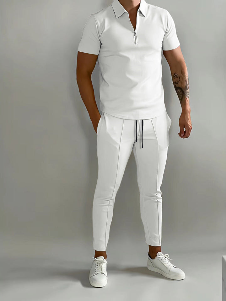 Men's coordinated short-sleeve polo shirt with matching casual pants set. Great for summer fashion.
